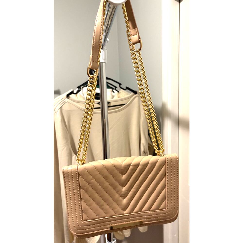 Lola Mae handbag, tan in color, with gold strap, can also be used as a crossbody